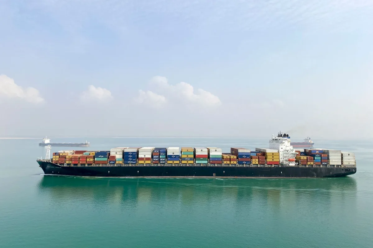 Aerial view of a container ship sailing through the Bab el Mandeb route.
