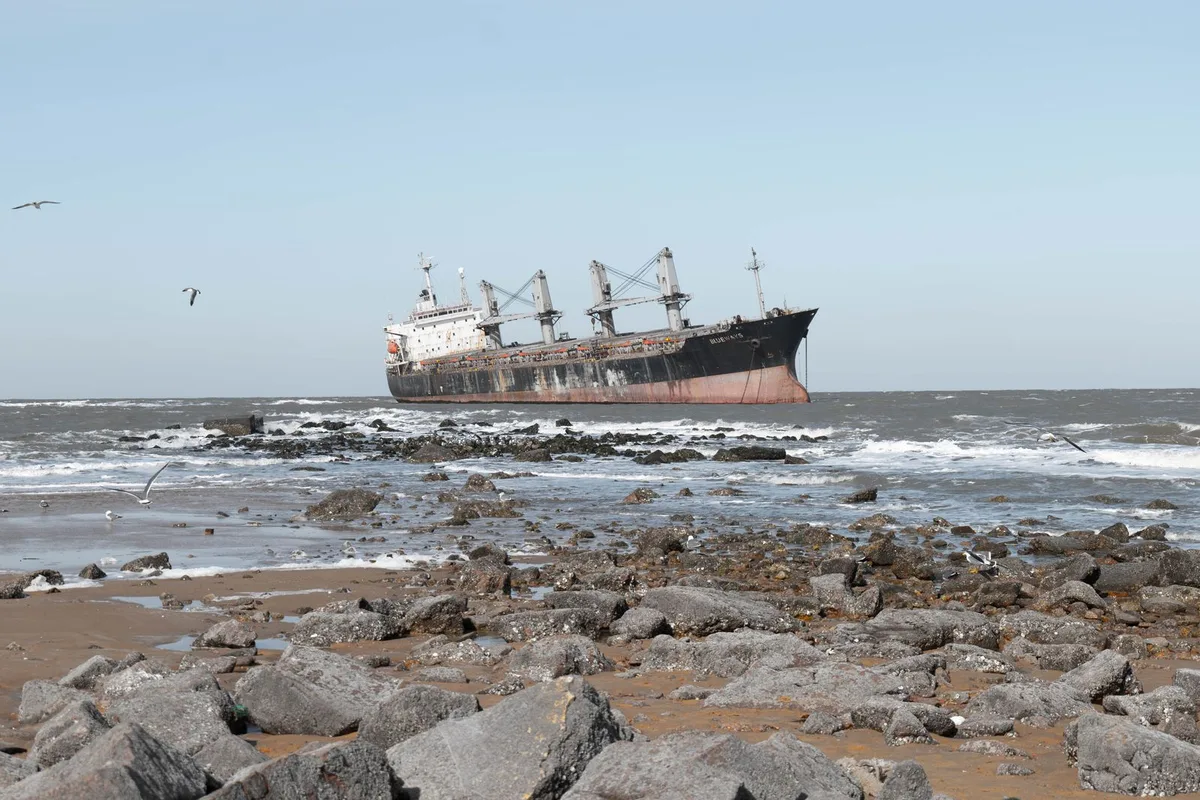 A sunken shipwreck resting on the ocean floor in Davy Jones Locker