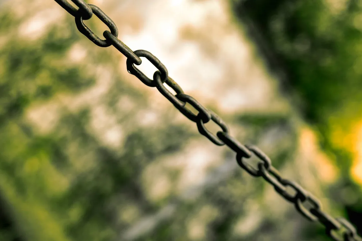 A heavy ship anchor with its chain on the forecastle