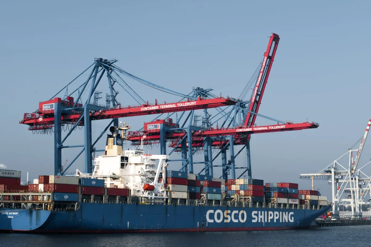 Containers stacked at a busy container terminal